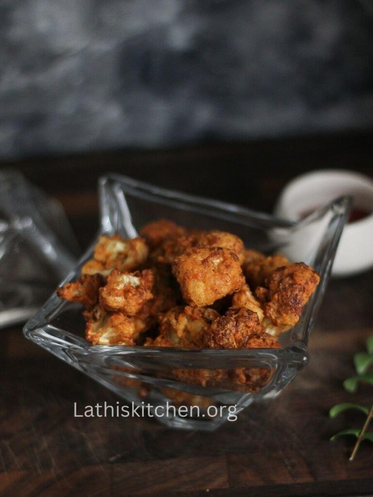 A bowl of air-fried cauliflower fry.