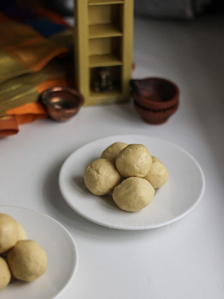 A plate with pottu kadalai ladoo.