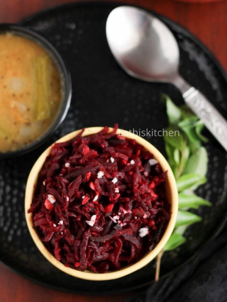A plate with Indian style stir fry using beetroot and coconut.