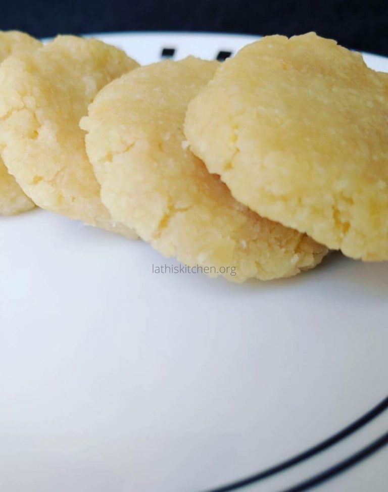 Almond coins in a plate.