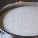 Fremented Idli dosa batter in a pot.