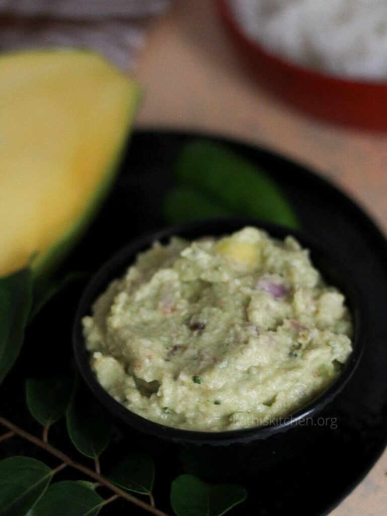 A bowl of raw mango chutney.