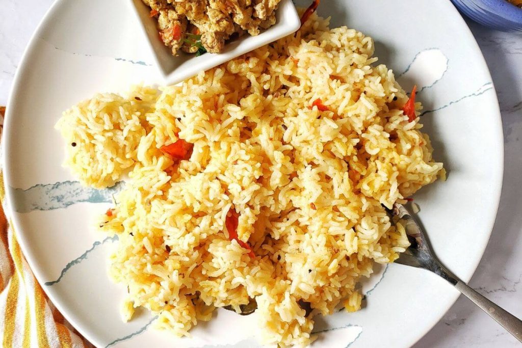 Plate of Lentil rice with scrambled eggs.