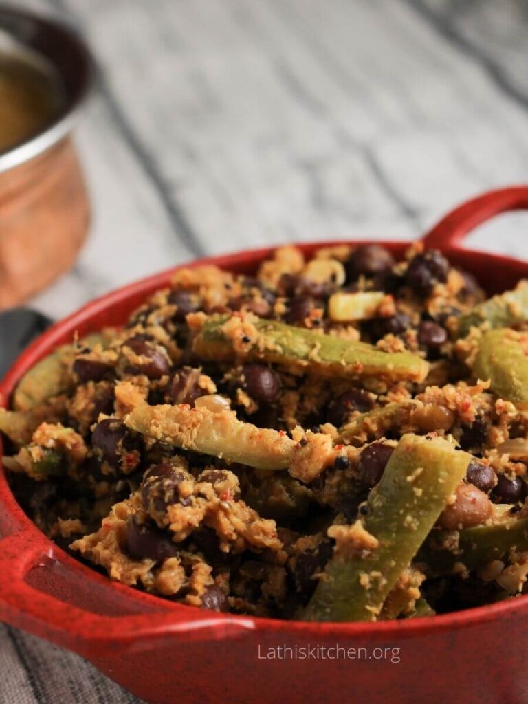 Bowl filled with black chickpeas and ivy gourd masala.