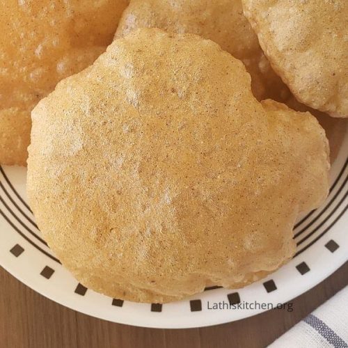 Deep fried, puffed whole wheat Indian bread.