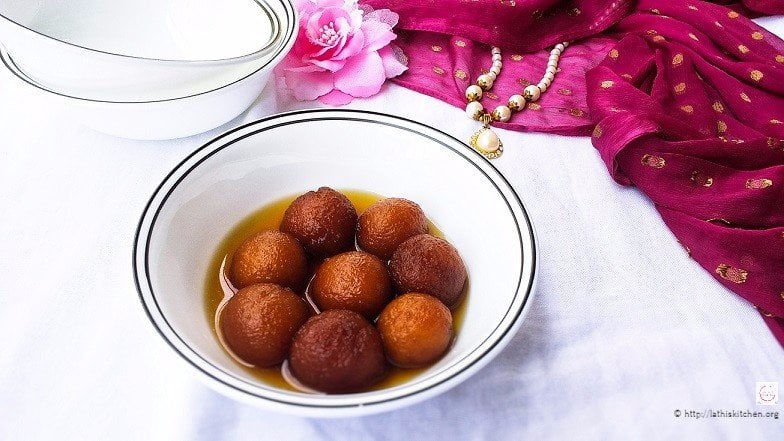 A bowl with Gulab Jamun.