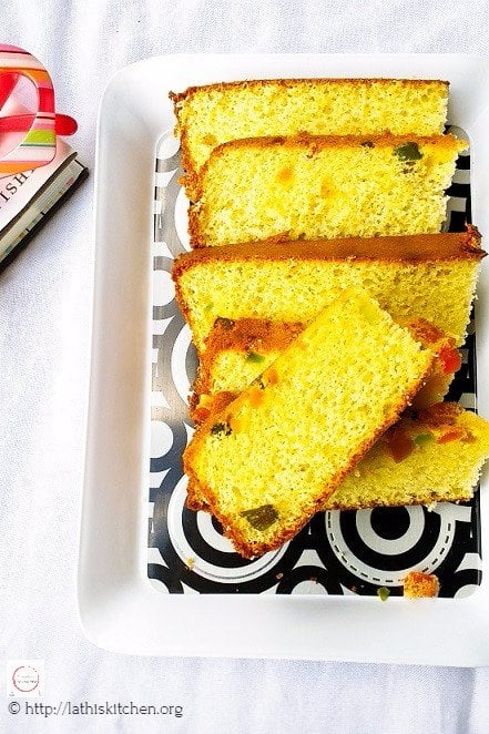 Slices of tutti frutti cake in a plate.