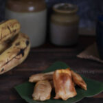 Pazham pori placed on a piece of banana leaf.
