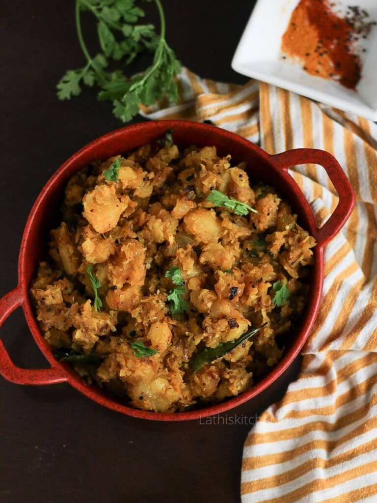 A bowl with Indian spiced mashed potatoes.