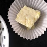 A slice of baked pineapple burfi.