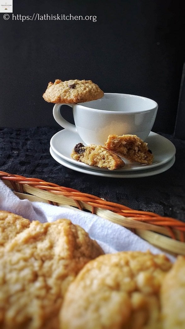 Whole wheat coconut cookies on a tea cup.