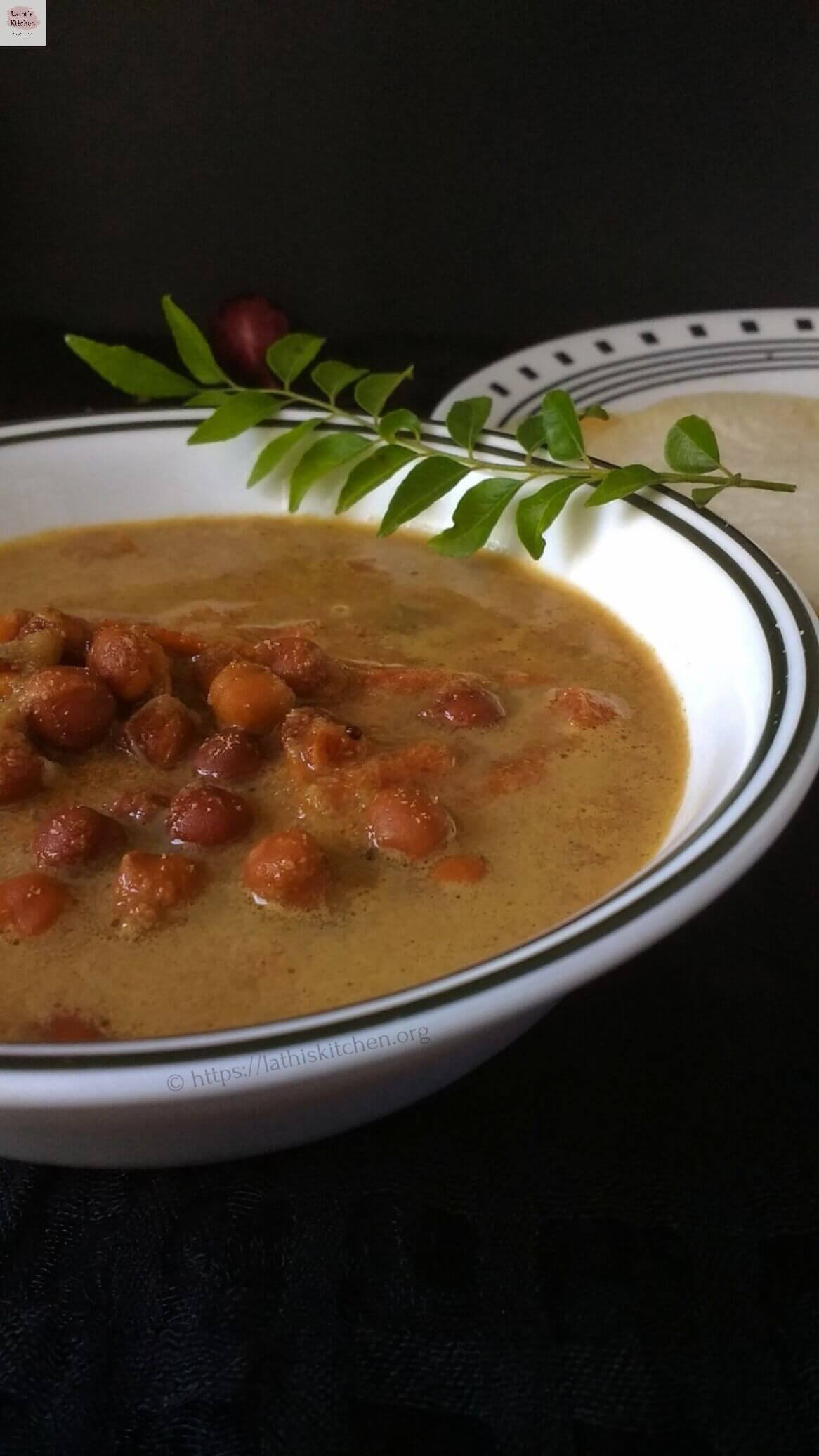 Bowl of Kerala Kadala Curry with curry leaves.