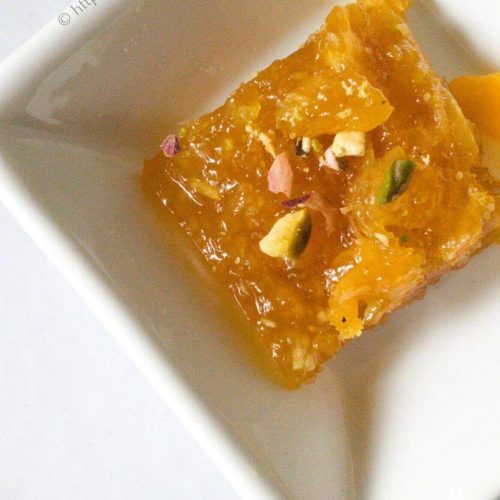 Bowl with mango coconut burfi.