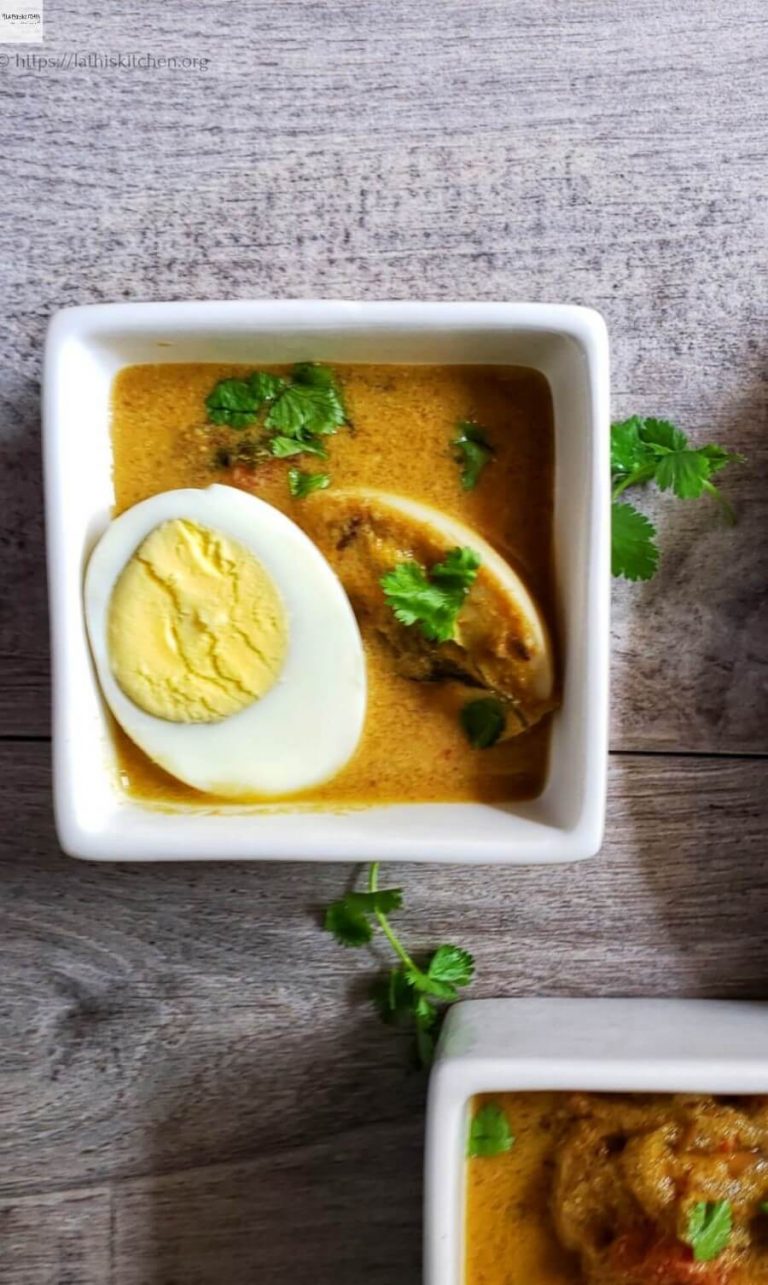 Bowl of Chettinad Egg Curry with hard-boiled egg.