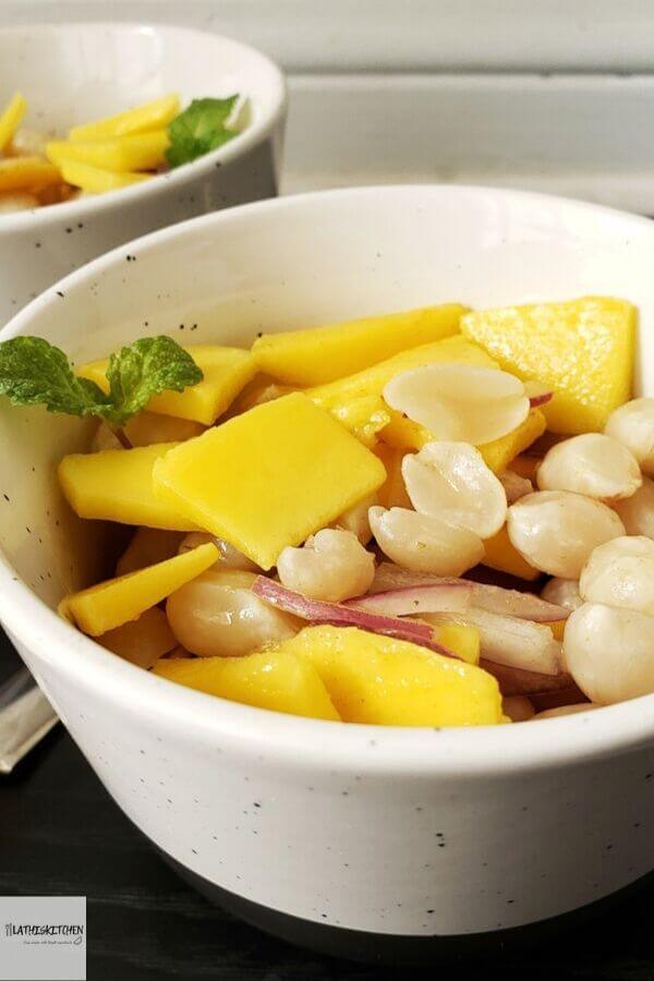 Bowl of boiled peanut mango salad.