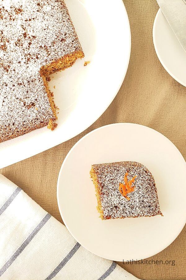 Cut piece of Eggless Carrot cake.