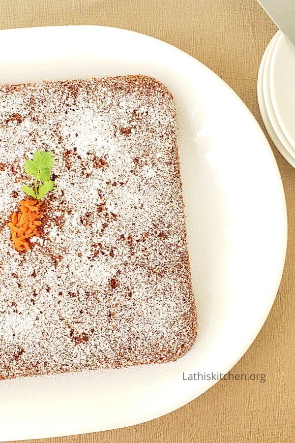A plate with egg less carrot cake.