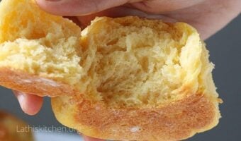 Half opened dinner rolls.