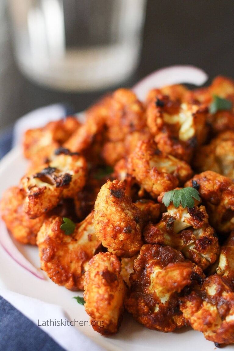 Close up of Tandoori Cauliflower bites in a plate.