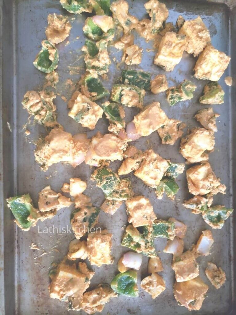 Marinated paneer and veggies on the baking tray.