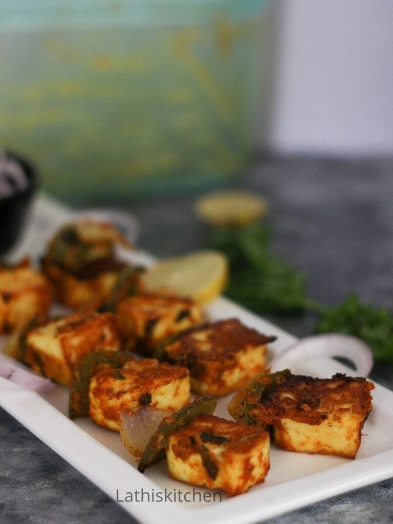 Paneer tikka cubes on the plate.