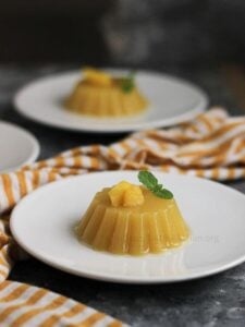 Vegan mango jelly in a plate.